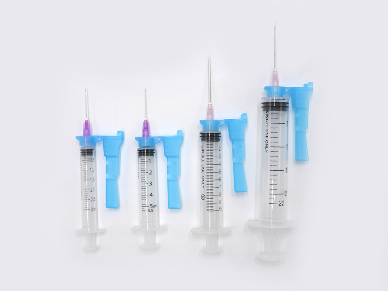 Disposable syringe with safety needle